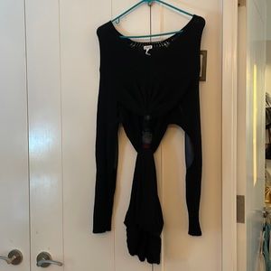 Loewe cut out sweater with leather elbow pads and metallic thread detailing